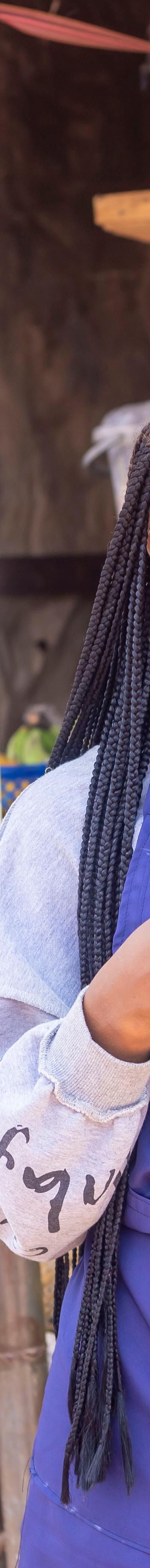 WSSD2 Solutions Session Woman on her phone in Africa